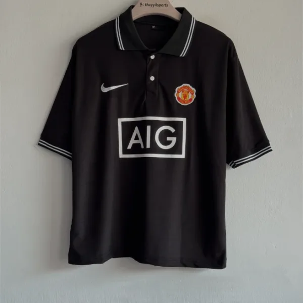 TSHIRT MANCHESTER UNITED BLACK FIVESLEEVE POLO EMBROIDERY